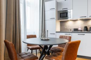 مطبخ أو مطبخ صغير في Trendy apt with - smart TV, coffee machine in Meidling