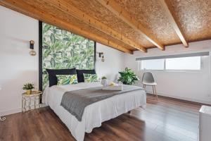 A bed or beds in a room at Casa Adayeim 2