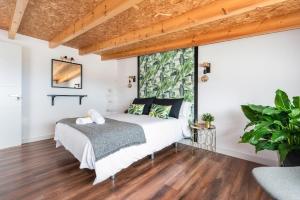 A bed or beds in a room at Casa Adayeim 2