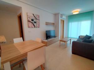 TV a/nebo společenská místnost v ubytování ACV - Playa Dorada-1ª Linea Planta 5 Norte