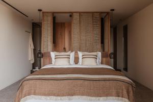 Postel nebo postele na pokoji v ubytování Casa Cook Samos - Adults only
