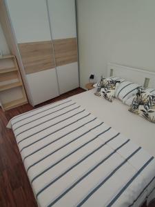 Posteľ alebo postele v izbe v ubytovaní Apartment Dalma