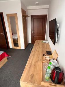 Telewizja i/lub zestaw kina domowego w obiekcie Willa WIKTORIA