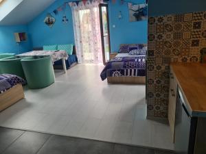 Postel nebo postele na pokoji v ubytování Willa Kaper