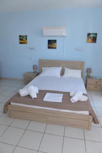 Postel nebo postele na pokoji v ubytování Blue Rooms