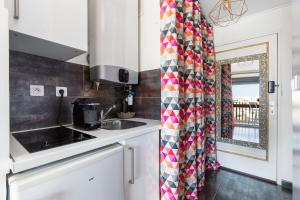 Кухня или мини-кухня в Cap d'Agde Studio - Village naturiste
