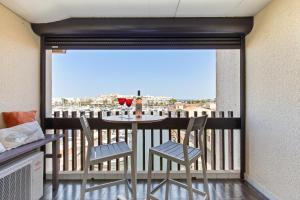 Балкон или терраса в Cap d'Agde Studio - Village naturiste