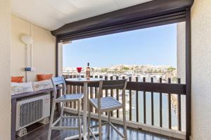 Балкон или терраса в Cap d'Agde Studio - Village naturiste