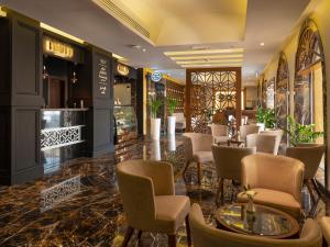 Χώρος καθιστικού στο Retaj Inn Al Wakrah