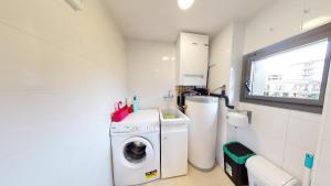 Kuchyň nebo kuchyňský kout v ubytování Apartaments La Rosella