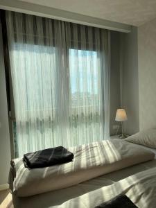 Katil atau katil-katil dalam bilik di Antalya Residence by Lara