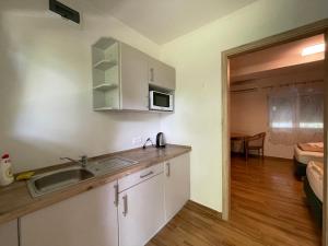 Cucina o angolo cottura di Liget Üdülőpark Fonyód