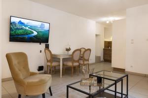 TV o dispositivi per l'intrattenimento presso Travel Homes - The Ancienne Poste, Petite Venise
