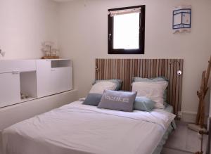 Posteľ alebo postele v izbe v ubytovaní Chambre d'hôtes Les terrasses de Saint Clair