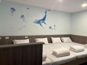 Letto o letti in una camera di Ye Yuan Star Homestay