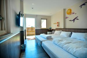 Ліжко або ліжка в номері Ye Yuan Star Homestay