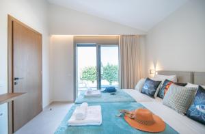 Postel nebo postele na pokoji v ubytování Grande Mandi & Jani Villa by "elite"