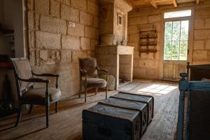 Posezení v ubytování Suite campagnarde près Bordeaux, vue sur les vignes au Château Camponac