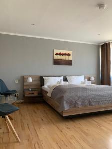 Postel nebo postele na pokoji v ubytování HGH - Hotel Garni Helbig