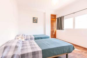 Posteľ alebo postele v izbe v ubytovaní Apartamento CAPRI en Nerja