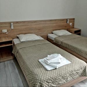 Voodi või voodid majutusasutuse Hotel Giorgi toas