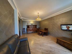 TV a/nebo společenská místnost v ubytování Guesthouse Anna