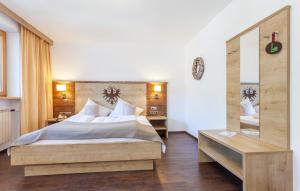 Postel nebo postele na pokoji v ubytování Hotel Stern