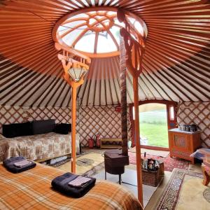 Postel nebo postele na pokoji v ubytování Iceland yurt