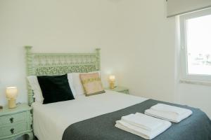 Кровать или кровати в номере Casa Vale do Ouriço
