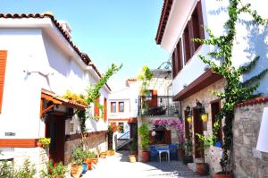 a street in an old town with buildings at Villa Ephesus in Kuşadası