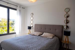 Ένα ή περισσότερα κρεβάτια σε δωμάτιο στο Résidence Domaine d'Arca Porto Vecchio - T2 haut standing - 4 personnes "David 7"