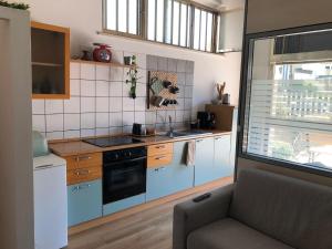 Kuchyň nebo kuchyňský kout v ubytování Il piccolo Loft