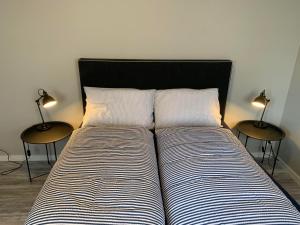 Postel nebo postele na pokoji v ubytování Notodden Sentrum Apartment NO 8