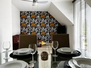Posedenie v ubytovaní Apartamenty Villa Fiori - Wyspa Sobieszewska