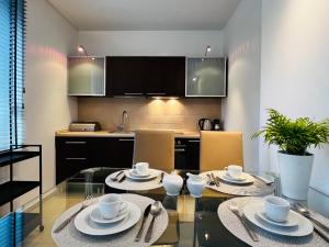 Kuchyňa alebo kuchynka v ubytovaní Apartamenty Villa Fiori - Wyspa Sobieszewska