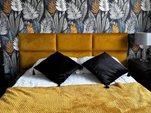Posteľ alebo postele v izbe v ubytovaní Apartamenty Villa Fiori - Wyspa Sobieszewska