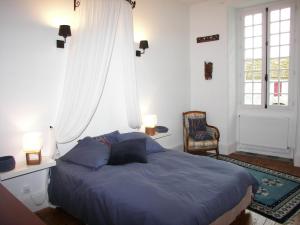 Posteľ alebo postele v izbe v ubytovaní Domaine du Noble