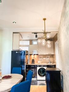 A cozinha ou cozinha compacta de Next Level Apartment