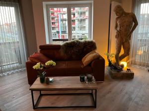 Posezení v ubytování Luxueus nieuw zonnig hoekappartement SEAVIEW Heldenplein - ruime garagebox - 2 fietsen