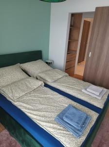 A bed or beds in a room at ORLIK