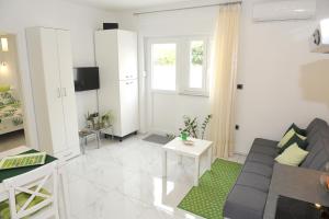 TV a/nebo společenská místnost v ubytování ONDINA apartments