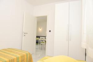 Postel nebo postele na pokoji v ubytování ONDINA apartments