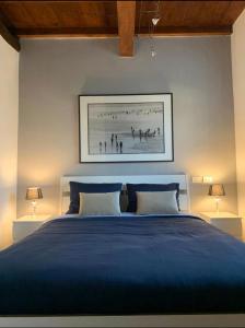 Кровать или кровати в номере Colline Di Barengo Apartment