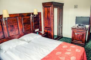 Cama o camas de una habitación en Usadba Meshcherskaya Park-Hotel