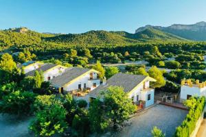 an aerial view of a house with mountains in the background at Alojamiento Rural Sierra de Castril in Castril