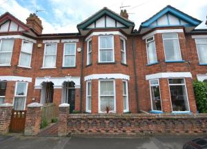 a large red brick house with white windows at Luxurious Victorian Home by the sea - Myana House in Lowestoft