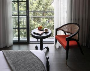 Posezení v ubytování ARTIS Hotel Da Lat + 37 fotografií
