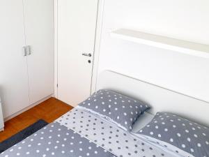 Posteľ alebo postele v izbe v ubytovaní Ones