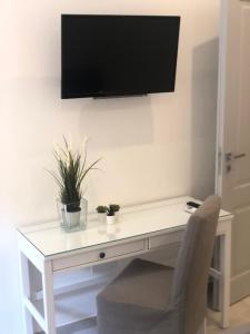 TV a/nebo společenská místnost v ubytování Tannur Del Carmine + 37 fotografií