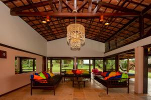 Posezení v ubytování A Villa 8 suites 30 pessoas